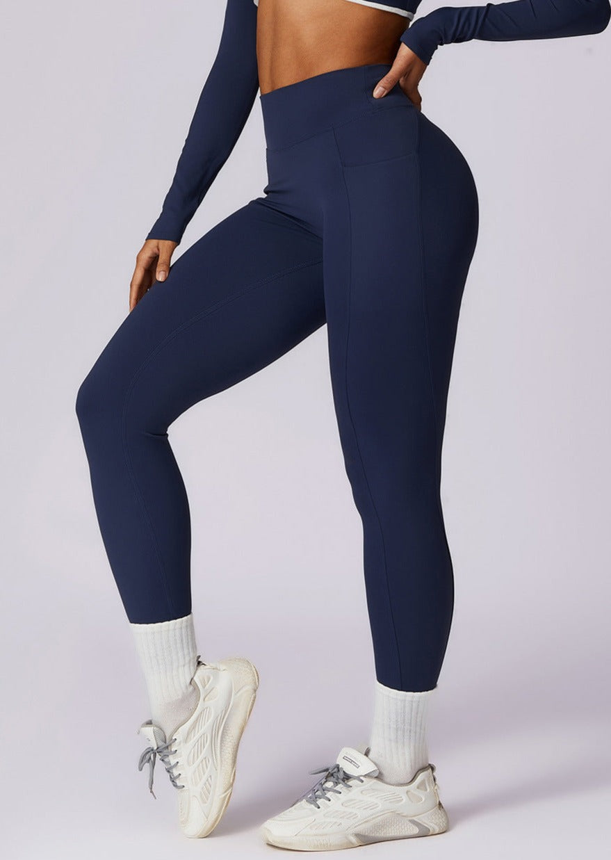 Legginsy damskie z kieszeniami granatowe bok