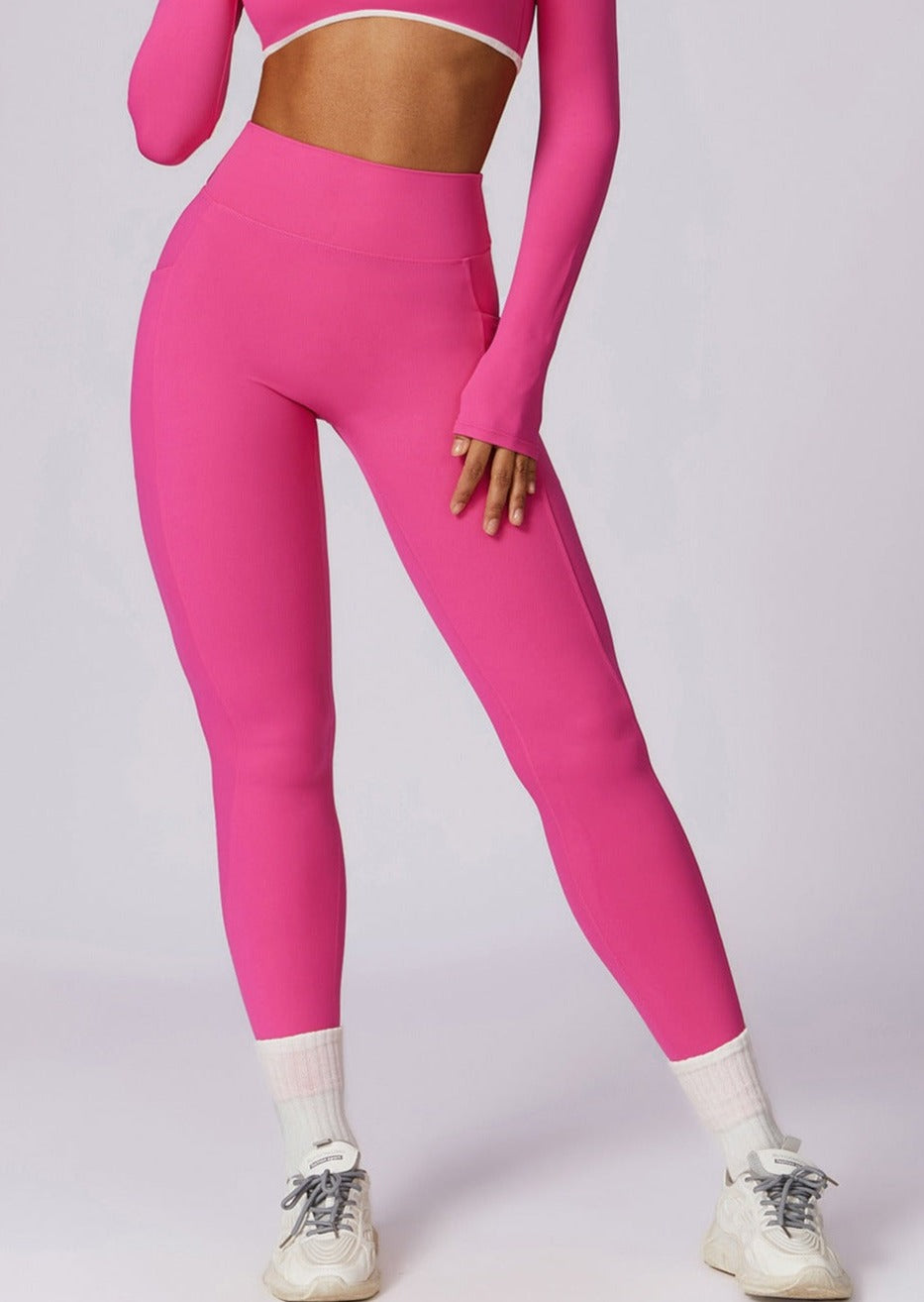 Legginsy damskie z kieszeniami różowe przód