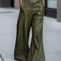 Szerokie spodnie damskie z wysokim stanem w kolorze ciemnozielonym